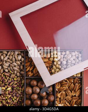 Food, Assorted nuts in a wooden box Stock Photo