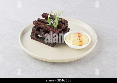 Food, Rye rusks with garlic. Garlik bread snack for beer. Bread with garlic. Rye bread croutons with garlic sauce. Beer snack. Fried rye croutons Stock Photo