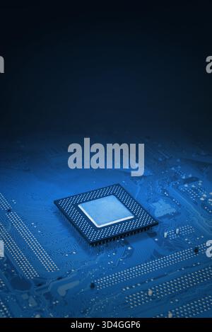 Blue computer motherboard with a central processor chip, blurred background symbolizing modern computing power, digital technology and hardware innova Stock Photo