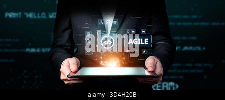 Business professional utilizing a tablet to showcase agile methodologies and AI technology, emphasizing innovation and digital transformation in Stock Photo