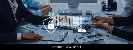 A dynamic business setting showcasing two-factor authentication on a screen. Emphasis on security, teamwork, and technology enhancing modern Stock Photo