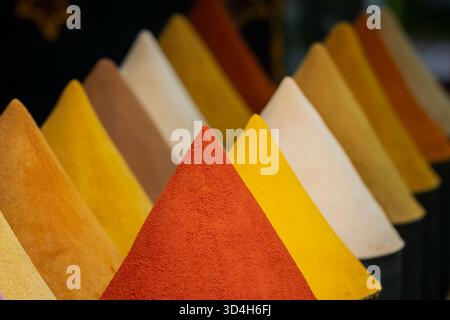 Spices at the market Marrakech, Morocco, for use as a cover design or background. Paprika powder i foreground, warm colors. Stock Photo