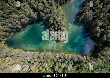 Äntu blue lake in Estonia, a clear water lake shining in emerald colors Stock Photo