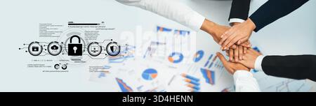 Team Collaboration and Cybersecurity Concept with Hands Stacking on Documents Featuring Graphs and Lock Symbols for Business Partnership and Stock Photo