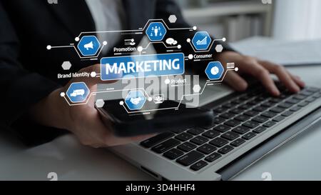 This image showcases modern marketing strategies using digital tools, featuring a laptop and smartphone. It emphasizes key concepts like brand Stock Photo