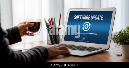 Software update on computer for modish version of device software upgrade Stock Photo
