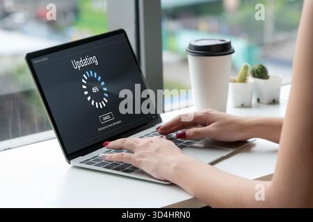 Software update on computer for modish version of device software upgrade Stock Photo