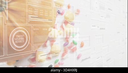 Displaying glossy round candies in assorted colors with translucent dashboard UI panels in studio Stock Photo