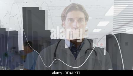 Standing central male clinician wearing white coat and stethoscope displaying data overlays in hall Stock Photo