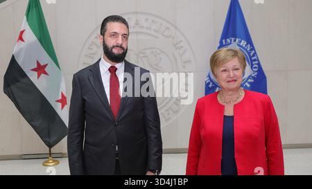 Washington DC, USA. 10 Nov, 2025. Syria's President Ahmed al-Sharaa (L) with International Monetary Fund (IMF) Managing Director Kristalina Georgieva (R) ahead of their meeting in Washington, DC on November 9, 2025.on Monday on November 10, 2025. Syrian President Ahmed al-Sharaa held an unprecedented meeting with U.S. President Donald Trump at the White House, just days after Washington removed his name from its terrorism blacklist. Al-Sharaa whose rebel forces toppled longtime ruler Bashar al-Assad late last year, became the first Syrian leader to visit the White House since the country's ind Stock Photo