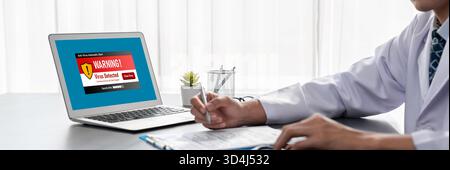 Virus warning alert on computer screen detected brisk cyber threat , hacker, computer virus and malware Stock Photo