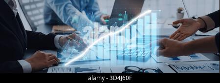 Business team collaborates in a bright office, analyzing financial growth data and graphs using modern technology for strategic decision-making. Axiom Stock Photo