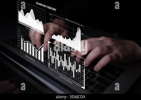 A person analyzing financial data on a laptop, with various graphs and charts displayed. The image illustrates data-driven insights and business Stock Photo