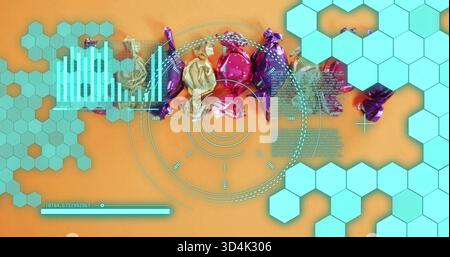 Displaying foil-wrapped candies shimmering in studio flat-lay on orange surface, with turquoise HUD Stock Photo