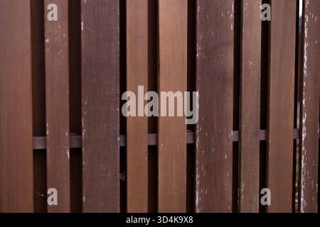 Wooden wall with vertical panels in different shades. High quality photo Stock Photo