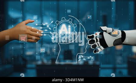 This image showcases the interaction between a human hand and a robotic hand, symbolizing the collaboration between artificial intelligence and human Stock Photo