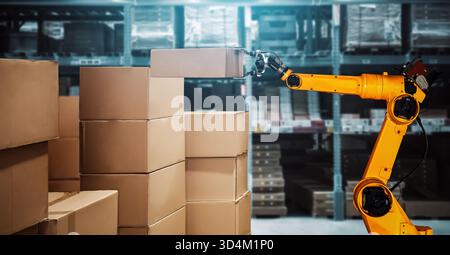 Smart robot arm system for innovative warehouse and factory digital technology . Automation manufacturing robot controlled by industry engineering Stock Photo
