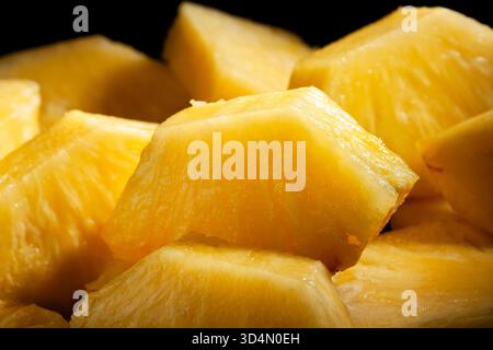 sliced pineapple on black background Stock Photo