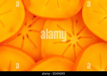 sliced persimmon close up detail Stock Photo