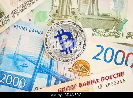 Bitcoin on banknote Stock Photo