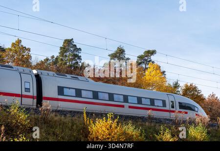 German high speed train traveling on a sunny autumn day near Nuremberg Stock Photo
