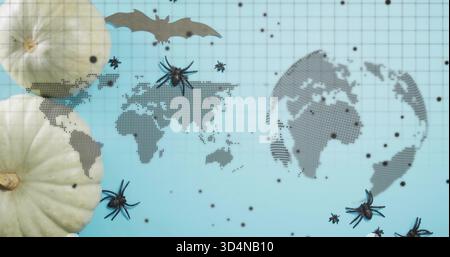Featuring halftone map, dotted globe on grid sheet with two white pumpkins, black spiders, bat Stock Photo