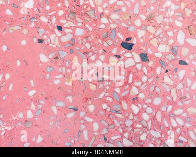 surface of polished pink flooring stone tile Stock Photo