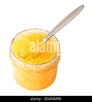 yellow caviar of river rainbow trout fish in glass jar with spoon from Armenia cutout on white background Stock Photo