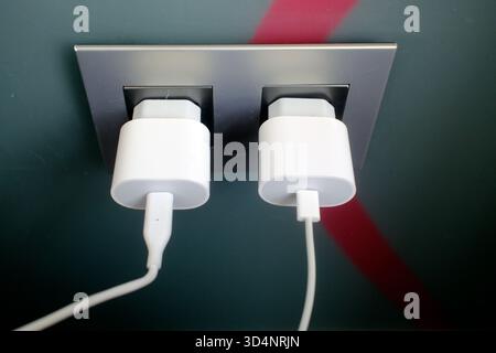 Two sockets for charging a smartphone and a tablet. Ho Chi Minh city. Vietnam. Stock Photo