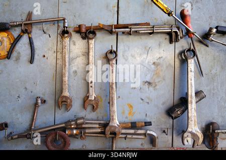 Old tools in a garage. Car repair. Kontum. Vietnam. Stock Photo