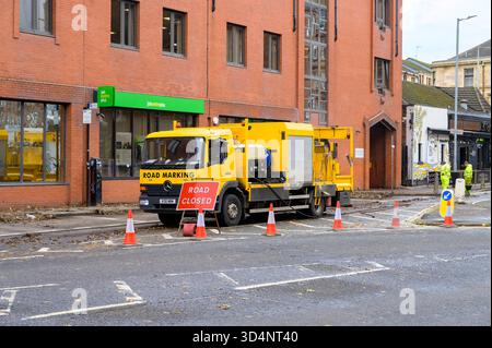Road Marking lorry with equipment to paint white lines, Benalder Street, Glasgow, Scotland, UK Stock Photo