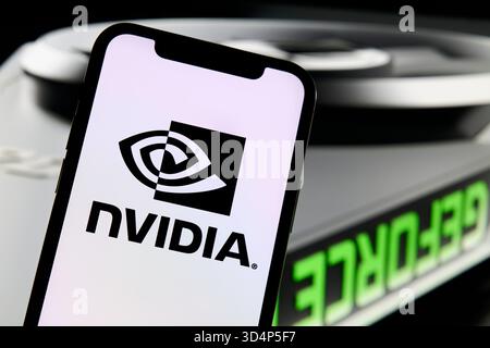 NVIDIA Logo Displayed on Smartphone with GeForce GPU Stock Photo