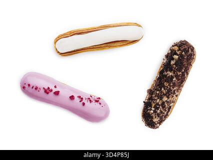 Food, Three different types of French eclairs on a white plate isolated on white background Stock Photo