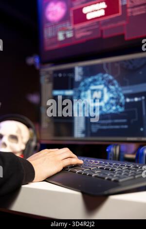 Closeup of hacker seeing critical error warning while stealing data from enterprise networks using AI deep learning. Evil man gets cyber attack rejected alert on monitor, using artificial intelligence Stock Photo