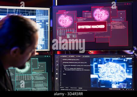 Hacker installing spyware using neural networks tech to secretly gather data about user activity. Rogue software developer coding exploits using AI technology to gain unauthorized access Stock Photo
