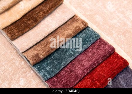 Various samples of upholstery in furniture shop. Sale Stock Photo