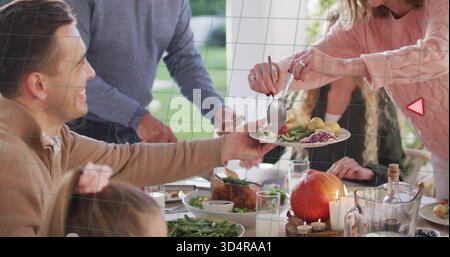 Reaching man in light brown sweater taking plate being served on porch with pumpkin, copy space Stock Photo