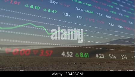 Displaying transparent market overlay moving over plowed field with utility pole, green line chart Stock Photo