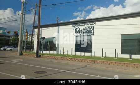Houston, TX, USA - July 9, 2025 - Collectors Firearms gun shop exterior stands prominently alongside a busy city street, featuring its large logo and Stock Photo