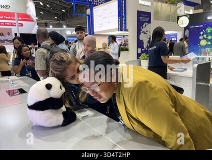 Cape Town, South Africa.11th November 2025. Guests learn about AI-powered plush toy at Chinese enterprise exhibition area during the 28th Africa Tech Festival on November 11, 2025 in Cape Town, South Africa. Credit: Sun Xiang/China News Service/17�Թ����� Live News Stock Photo