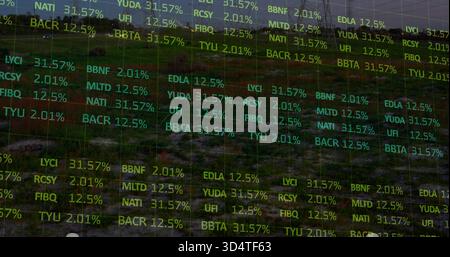 Displaying translucent grid overlay covering grassy hillside, showing tickers and percent values Stock Photo