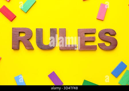 Word RULES with blocks on yellow background Stock Photo