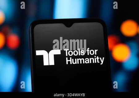In this photo illustration, the Tools for Humanity logo is seen displayed on a smartphone screen Stock Photo