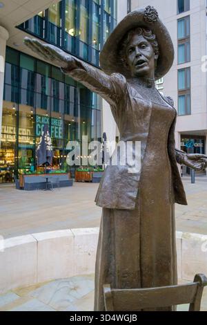 A statue of suffragette leader Emmeline Pankhurst (officially called Rise Up Women bronze sculpture in St Peter's Square Manchester. Stock Photo