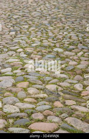 Traditional old cobblestone pathway background Stock Photo - Alamy