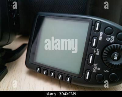 Wroclaw, Poland - September 9 2024: A modern camera and studio flash trigger with a large, clear display and intuitive controls, essential for precise Stock Photo