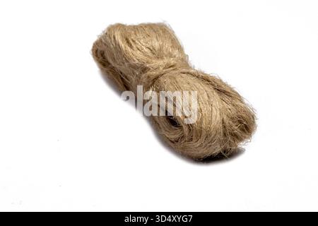 A raw flax fiber isolated on white background. Stock Photo