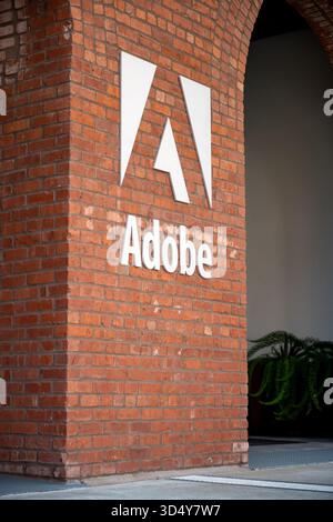 United States. 18th Sep, 2025. Adobe logo and sign mounted on red brick pillar at office entrance, San Francisco, California, September 18, 2025. (Photo by Smith Collection/Gado/Sipa USA) Credit: Sipa USA/Ģ����ý Live News Stock Photo