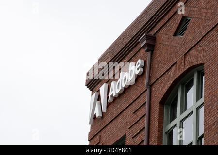 San Francisco, United States. 11th Sep, 2025. Adobe logo on brick office building facade with arched windows on an overcast day, San Francisco, California, September 11, 2025. (Photo by Smith Collection/Gado/Sipa USA) Credit: Sipa USA/Ģ����ý Live News Stock Photo