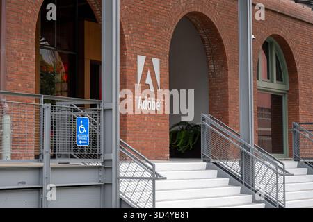 San Francisco, United States. 11th Sep, 2025. Adobe office entrance with logo on brick facade, metal railings, and accessible entrance sign, San Francisco, California, September 11, 2025. (Photo by Smith Collection/Gado/Sipa USA) Credit: Sipa USA/Ģ����ý Live News Stock Photo